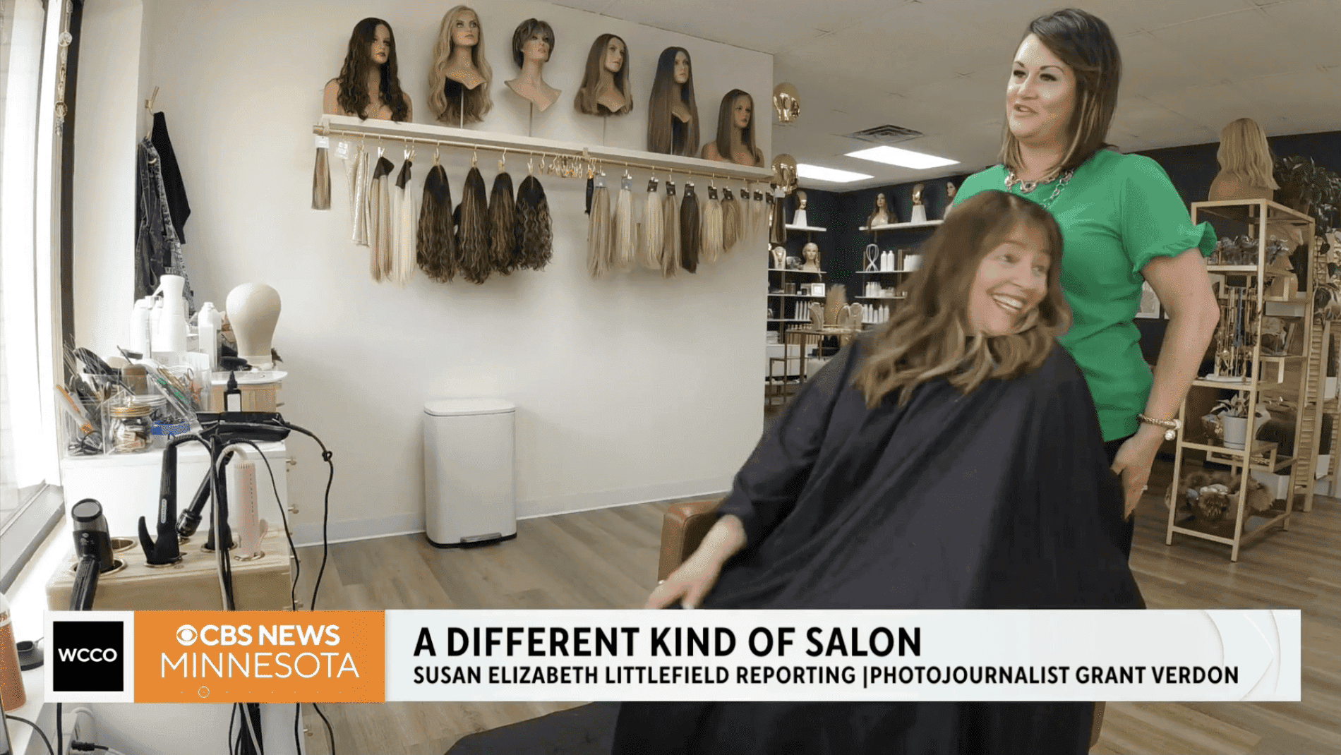 Customer enjoying a wig consultation at Wigs by Opulence in Minnesota.
