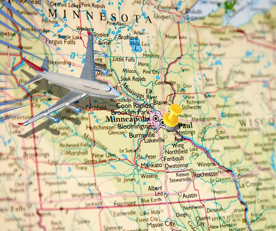 Wigs displayed on a map of Minnesota at Wigs by Opulence Salon MN.